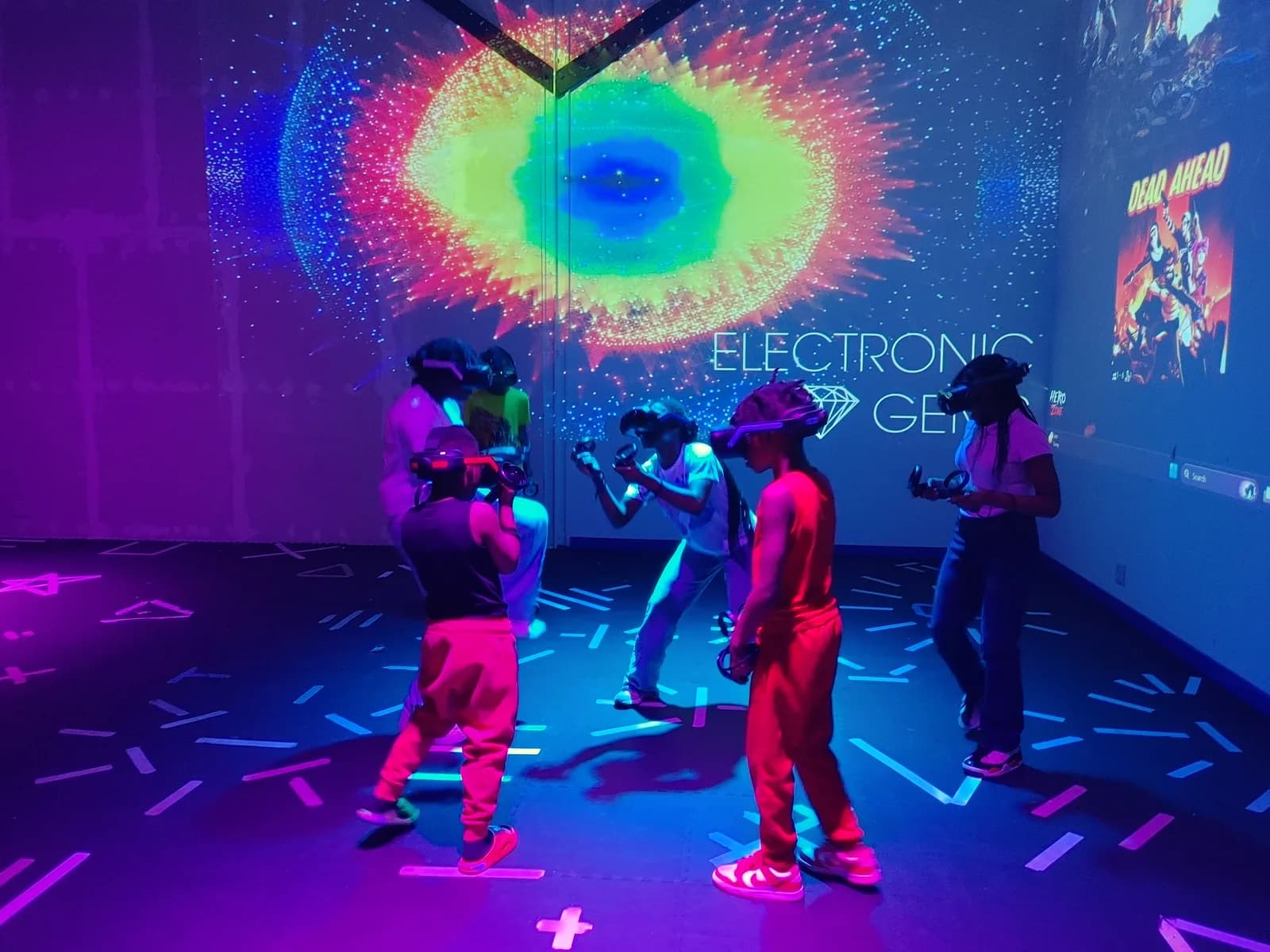 DRMI participants using virtual reality equipment in a learning environment.