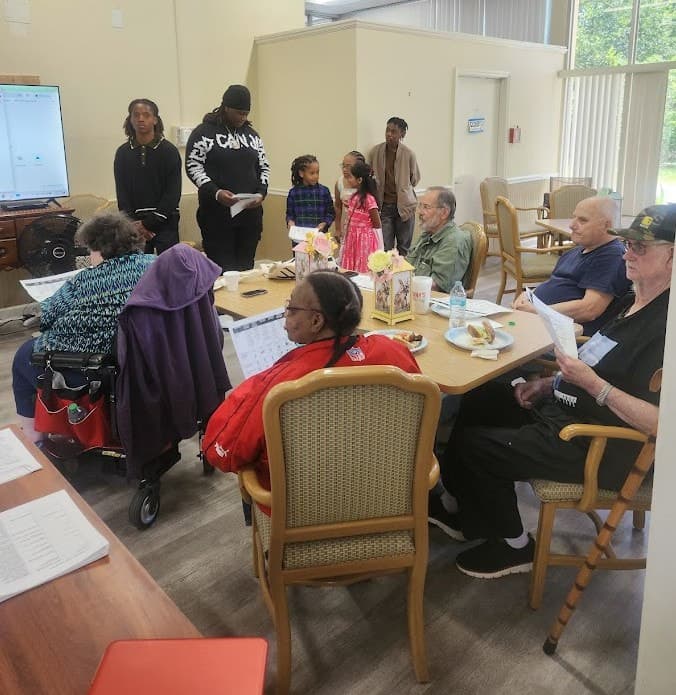 Geeks and Gramps participants in a technology learning session.